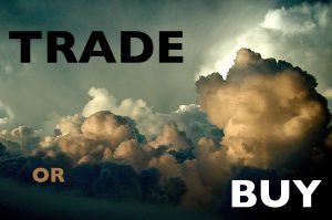 Image of the sky at dusk with the words Buy and Trade.